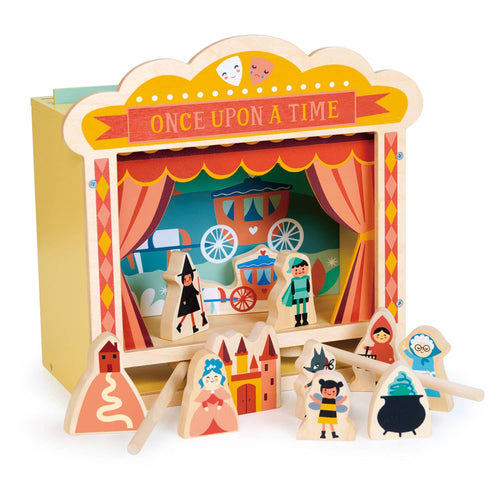 Wooden table top theatre by Mentari with illustrated backdrops and magnetic characters moved by wooden sticks for creative storytelling.