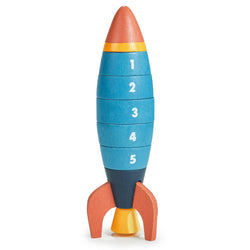 Wooden rocket stacking ring toy by Mentari, showing numbered rings 5 to 1 to be assembled in the correct order.