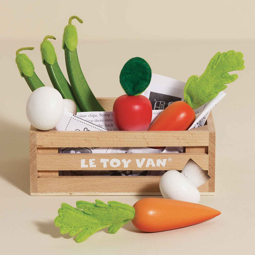 Wooden toy crate of assorted vegetables by Le Toy Van, featuring wood and fabric play pieces for healthy eating role play.