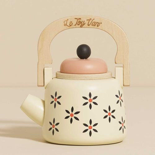 Wooden kettle toy by Le Toy Van, painted cream with delicate flora artwork and a removable lid for imaginative tea party play.